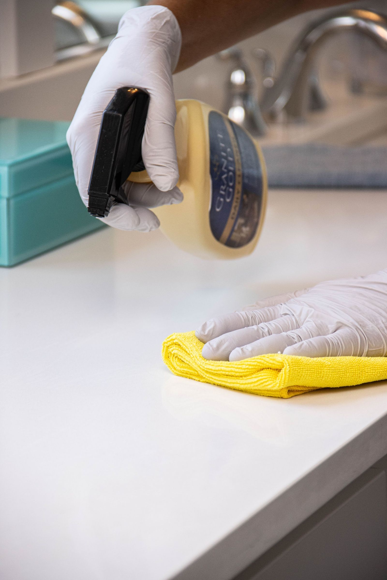 Wiping down kitchen counters in a busy Duvall family home during summer break